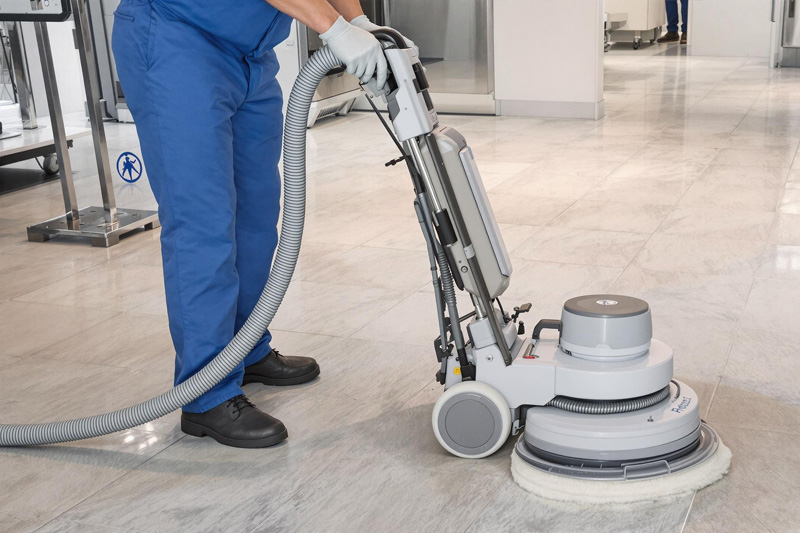 specialist cleaner polishing hard floor with rotary machine